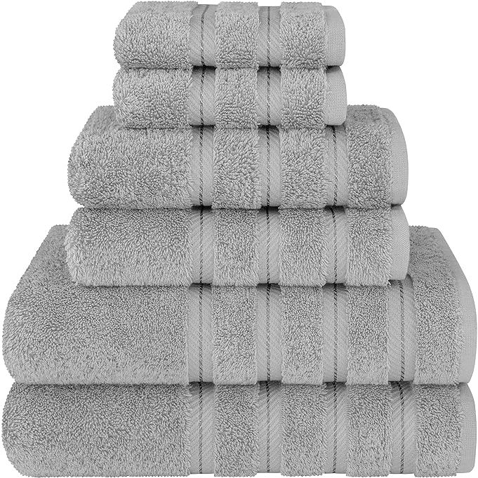 The American Soft Linen Luxury 6 Piece Towel Set includes 2 bath towels, 2 hand towels, and 2 washcloths. These towels are made from 100% cotton and are sourced from Turkey, known for its high-quality towels. The set comes in a stylish light grey color that will complement any bathroom decor.