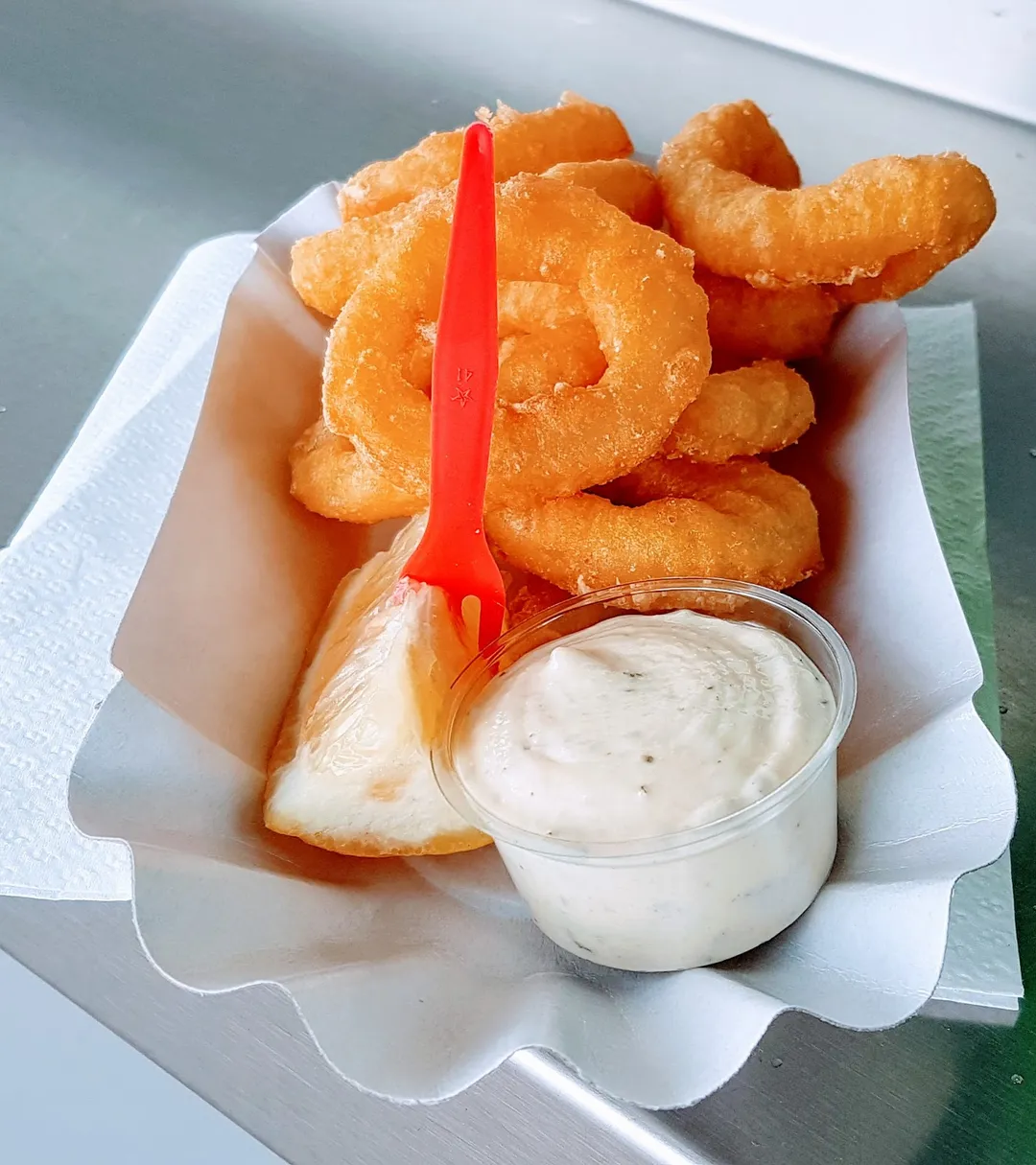 La Frite Vagabonde is a revered fast food destination, praised for its commitment to high-quality classics without the frills. This establishment may not catch the eye with grandeur, but it captures hearts with its consistently superb fries and other beloved fast food staples, offered at fair prices. The burgers might seem unassuming, yet they surprise many with their delicious taste. Catering to local tastes, La Frite Vagabonde also serves regional dishes, such as freshly prepared perch.