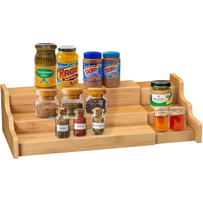 Maximize your kitchen efficiency with the elegantly designed Spice Rack Kitchen Cabinet Organizer. Crafted from robust bamboo, this 3-tiered storage solution offers both charm and functionality, seamlessly integrating into any kitchen aesthetic.