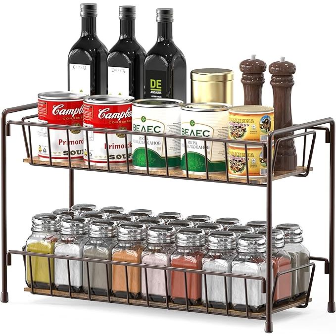 Elevate your culinary space with the sophisticated Simple Houseware Countertop Spice Rack. Expertly crafted with durable metal and finished in elegant bronze, this stylish 2-tier organizer is the perfect solution to declutter your kitchen and enhance your cooking efficiency.