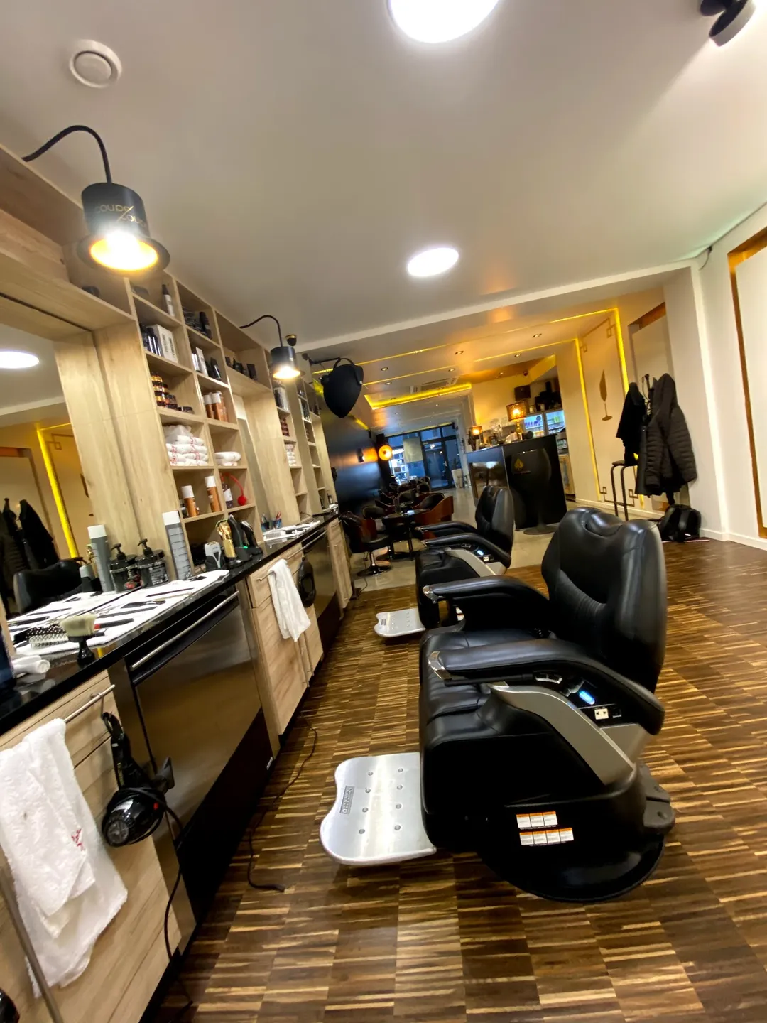 The ambiance strikes an inviting balance, cultivating a cozy vibe where guests feel at ease while receiving their cuts. Patrons consistently laud the skilled barbers for their ability to deliver precisely on the hair vision shared, resulting in an excellent styling experience that meets individual needs and preferences.