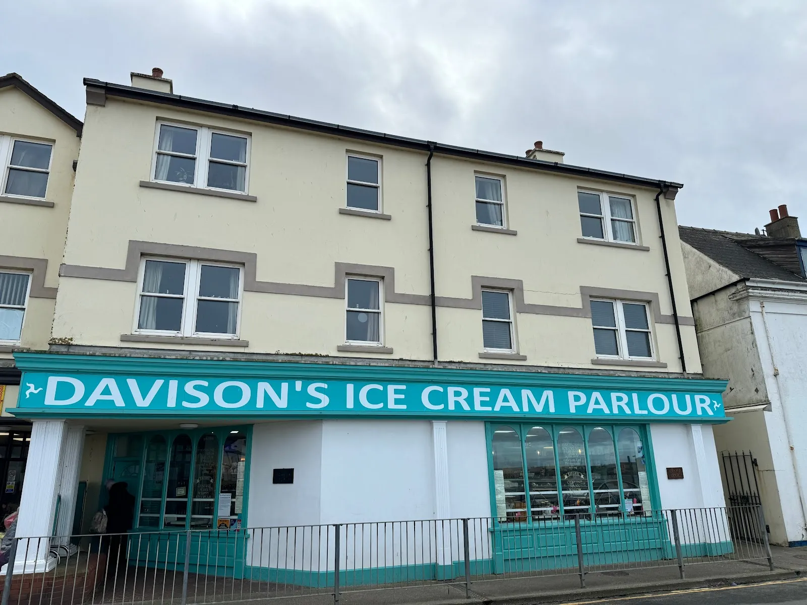 Discover a delightful indulgence at Davisons Ice Cream Parlour, a cherished destination in Peel for both locals and visitors alike. Savor the extraordinary experience of their out-of-this-world ice cream, which has become an essential part of any trip to the area, especially during the electrifying atmosphere of TT season. With an array of flavors to choose from, connoisseurs and curious tasters will find their perfect scoop, topped off with a variety of delicious toppings.
