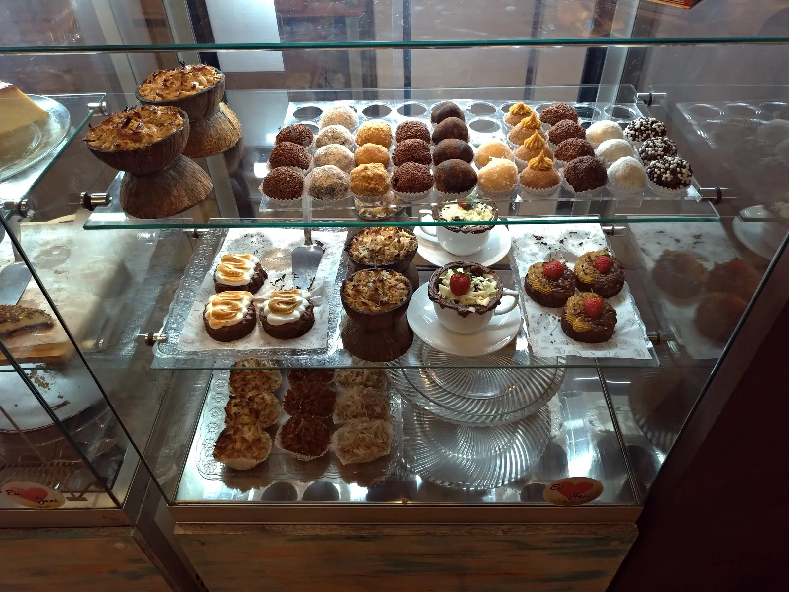 For those seeking a small but intense burst of sweetness, the small chocolate ball is recommended—a testament to the tastiness of the treats offered, even if they are on the sweeter side. The coffee selection also garners praise, with the espresso being hailed as the best in town, adding a robust and authentic option for coffee enthusiasts to enjoy.