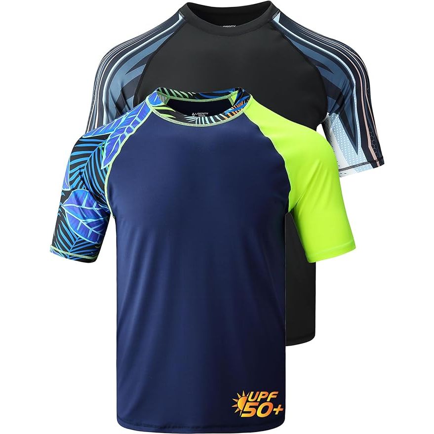 Liberty Imports 2-Pack Men's UV Short Sleeve Swim Shirts are designed for active men who enjoy water activities. These rash guards provide protection from the sun's harmful UV rays with a UPF 50+ rating. The loose fit design allows for comfortable movement in and out of the water.