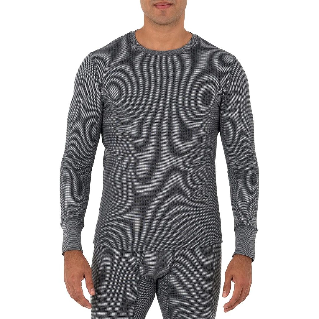 The Fruit of the Loom Men's Recycled Waffle Thermal Underwear Crew Top is designed for comfort and warmth during colder months. Made from a blend of recycled polyester and cotton, this crew top is soft against the skin and provides insulation to keep you warm.