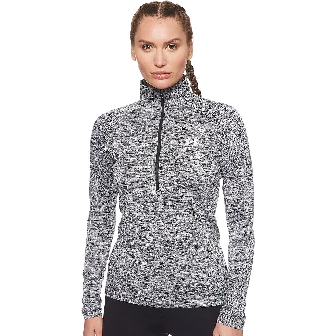 The Under Armour UA Tech™ Twist ½ Zip is a popular athletic jacket designed for both men and women. It is made with UA Tech™ fabric, which is quick-drying, ultra-soft, and has a more natural feel. This fabric also wicks away sweat and dries quickly, making it ideal for intense workouts or outdoor activities.