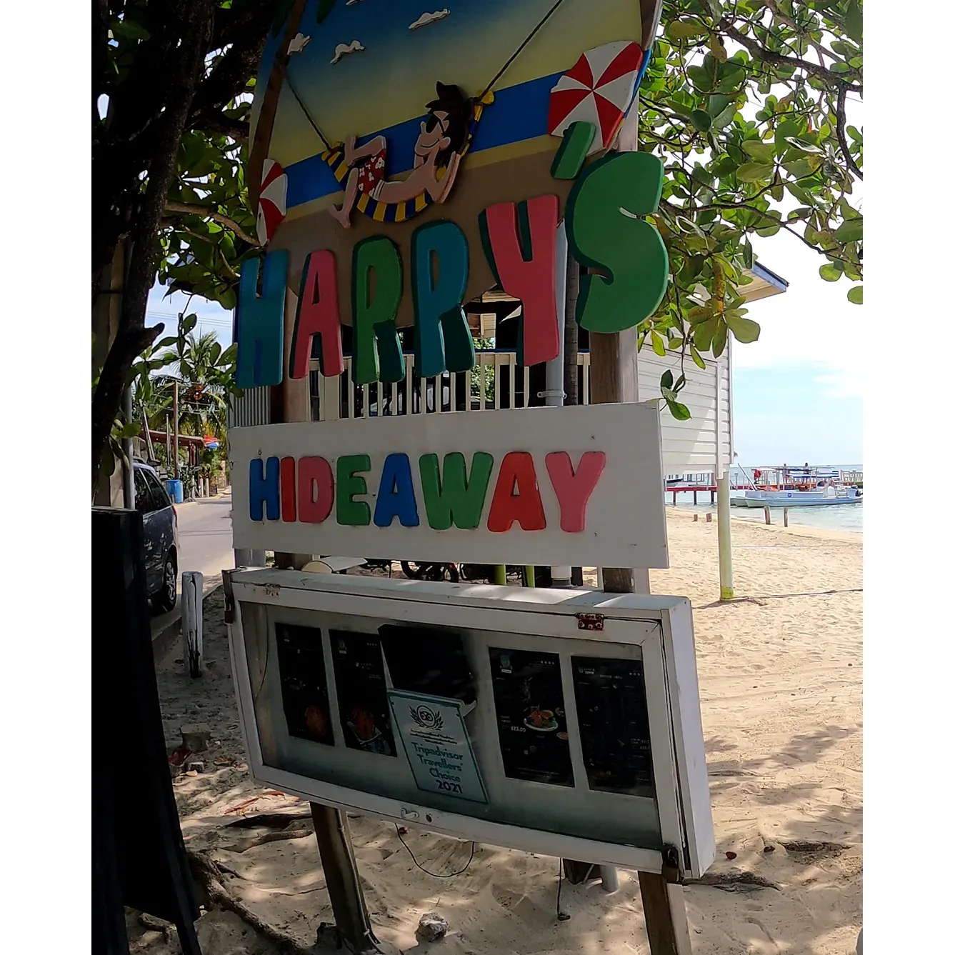 Overall, Happy Harry's HideAway may not be flawless, but for many, it remains a vibrant, delicious, and enjoyable Roatan spot that captures the spirit of island life. Description by ChatGPT.