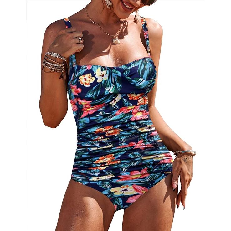 The Ekouaer Women's One Piece Swimsuit is a stylish and flattering option for women looking for a tummy control bathing suit. This retro-inspired swimwear features ruched detailing along the midsection, which helps to camouflage any problem areas and provide a slimming effect.