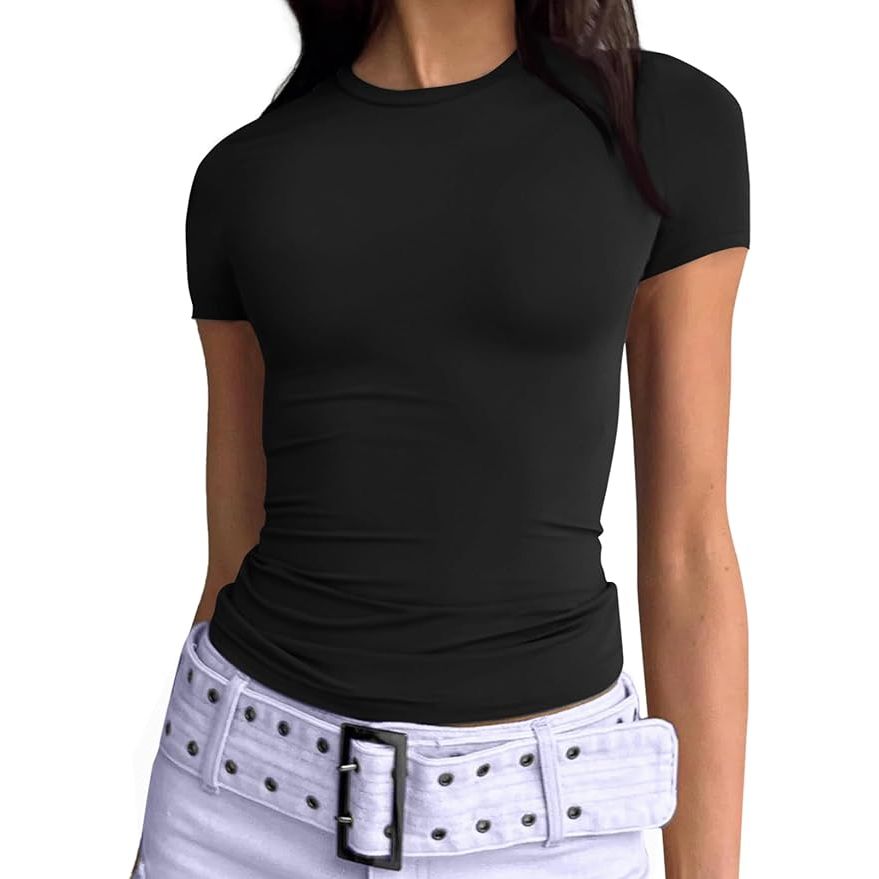 The Trendy Queen Womens Basic T-Shirts are fashionable, versatile tops that feature a scoop neck and short sleeves. These crop tops are designed to be stylish and trendy, making them perfect for the summer season. The slim fit of the tees creates a flattering silhouette that can be easily paired with a variety of bottoms for a chic and cute look.