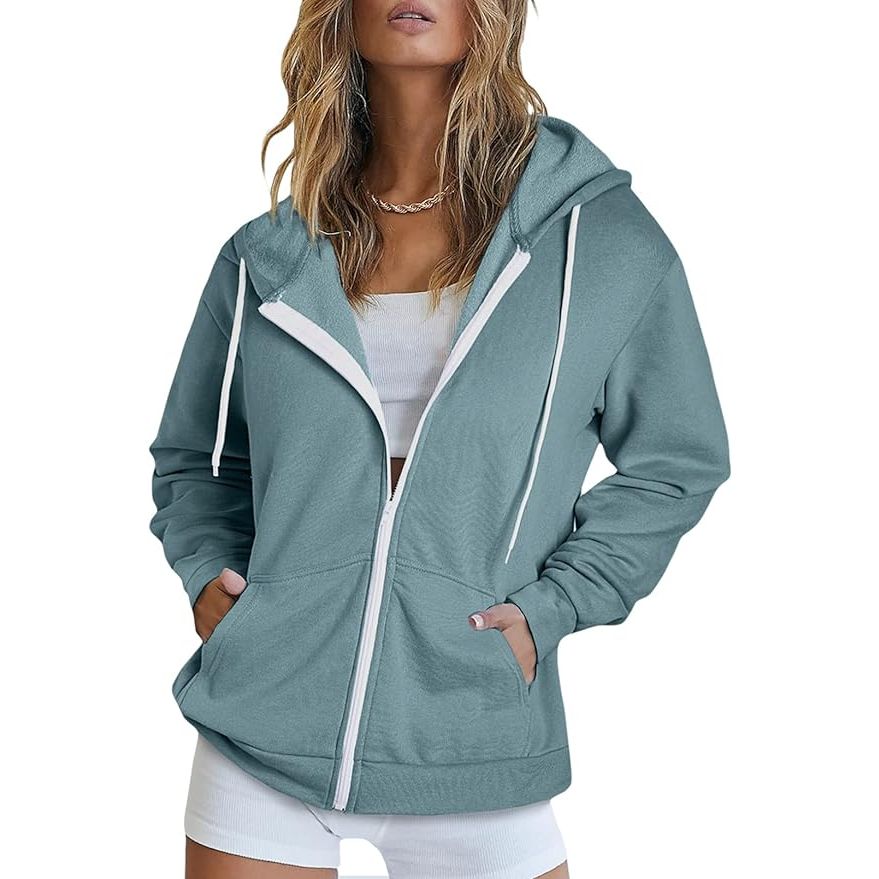 The Dokotoo Women's Full Zip Up Hoodie is a versatile and stylish addition to any woman's wardrobe. Made from a soft and comfortable fabric blend, this hoodie features a full zip up closure and long sleeves with a hood for added warmth and style. It also includes two front pockets for added convenience and functionality.