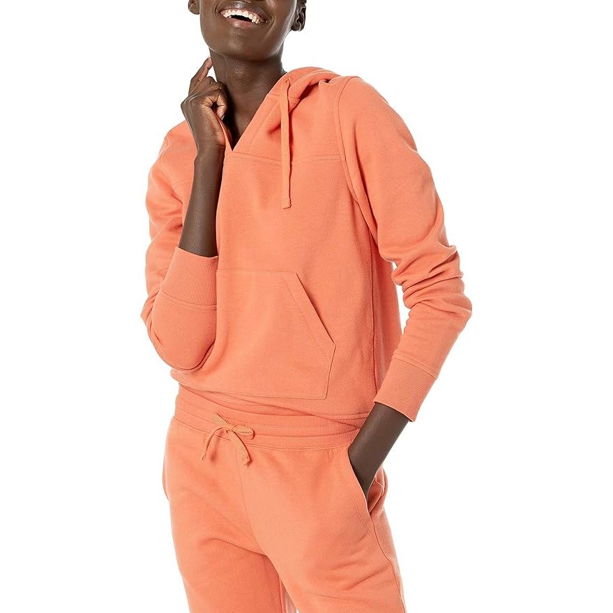 The Amazon Essentials Women's Classic-Fit Long-Sleeve Open V-Neck Hooded Sweatshirt is a cozy and versatile piece for your wardrobe. Made from a blend of cotton, polyester, and spandex, this sweatshirt is soft and comfortable to wear. The open V-neck design adds a touch of style to the classic hoodie look.