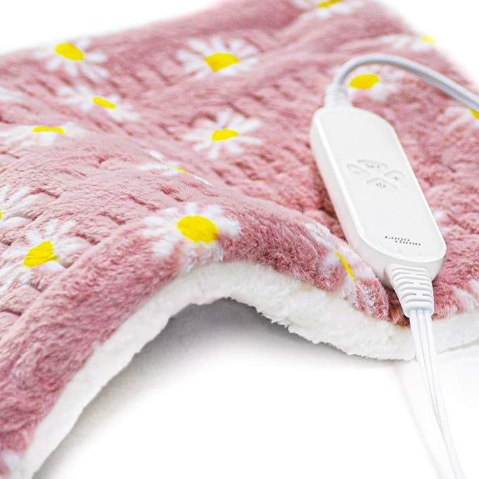 The GOQOTOMO Flower Heating Pad is a versatile and soothing solution for back pain relief. Measuring 12" x 24", this pad provides ample coverage for targeted relief of back discomfort. With 12 heat levels and 8 timers to choose from, you can customize your heating experience to suit your needs and preferences.