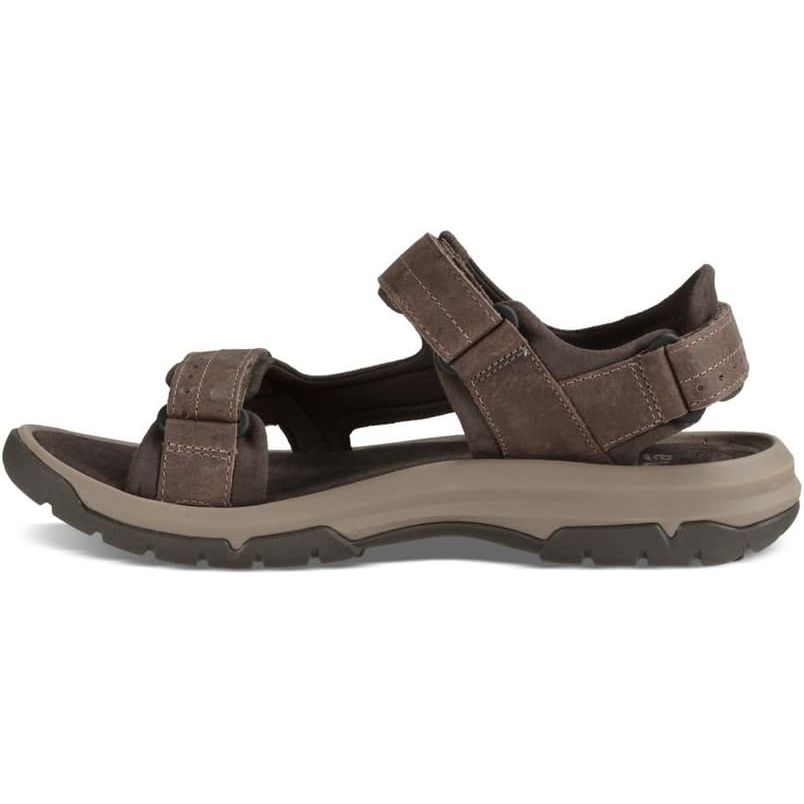 The Teva Men's M Langdon Sandal is a popular outdoor sandal designed for comfortable and durable wear. It features a synthetic and textile upper with a hook-and-loop closure for a secure fit. The sandal also has a cushioned EVA footbed for all-day comfort and support.