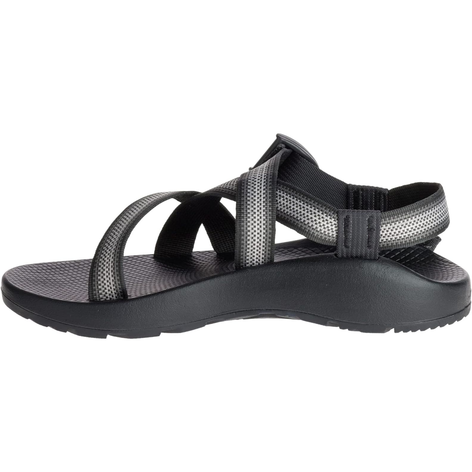 The Chaco Men's Z/1 Classic Sandal is a durable and versatile outdoor sandal designed for activities such as hiking, camping, and water sports. It features a durable polyester jacquard webbing strap that wraps around the foot and through the midsole for a secure and adjustable fit.