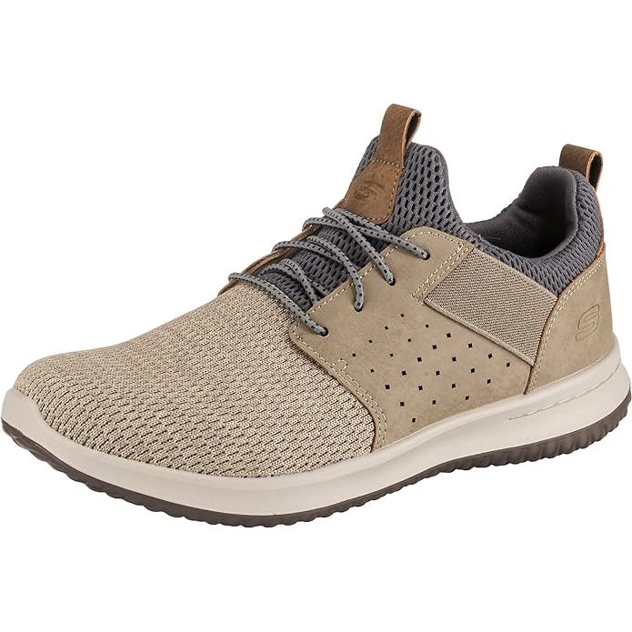 The Skechers Men's Relaxed Fit: Braver - Rayland shoes are a comfortable and stylish option for everyday wear. They feature a slip-on design with a moc toe front and stitching accents for a classic look. The shoes are made with smooth leather uppers and have a padded collar and tongue for added comfort.