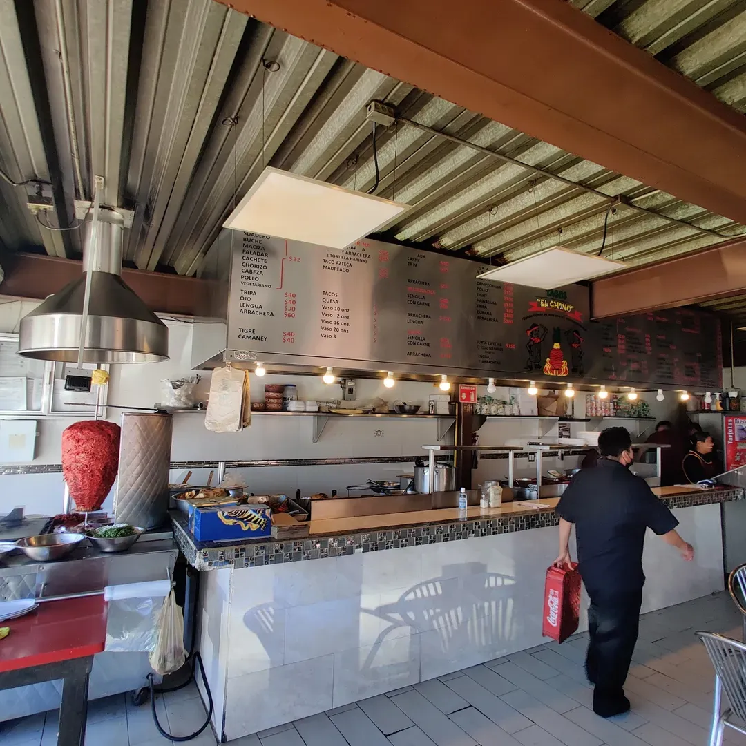 Tacos El Chino is a popular taco stand located in the town of Playas de Rosarito, Baja California, Mexico. The stand is situated at Ensenada 67 in the Predios Urbanos neighborhood, making it easily accessible to locals and tourists alike.