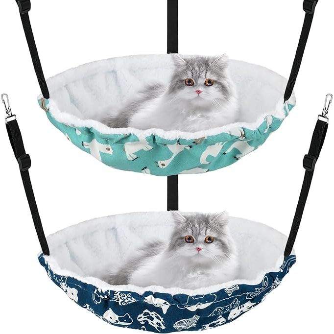 The Jetec 2 Pcs Reversible Cat Hanging Hammock is a cozy and comfortable bed for small animals, specifically designed for cats. The hammock is made of soft and breathable material, providing a comfortable resting spot for your furry friend. It is reversible, allowing you to choose between two different designs to suit your cat's preferences.