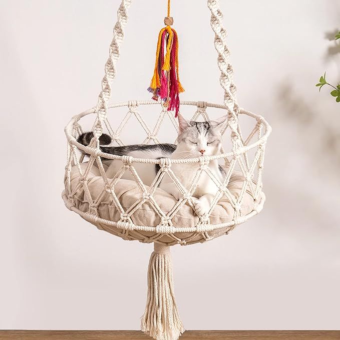 Introducing the latest 2022 fashion trend for your beloved feline friend - the Bohemian Style Cat Hammock! This stylish and unique cat hammock adds a touch of charm to your home decor while providing your pet with a cozy and comfortable place to lounge.