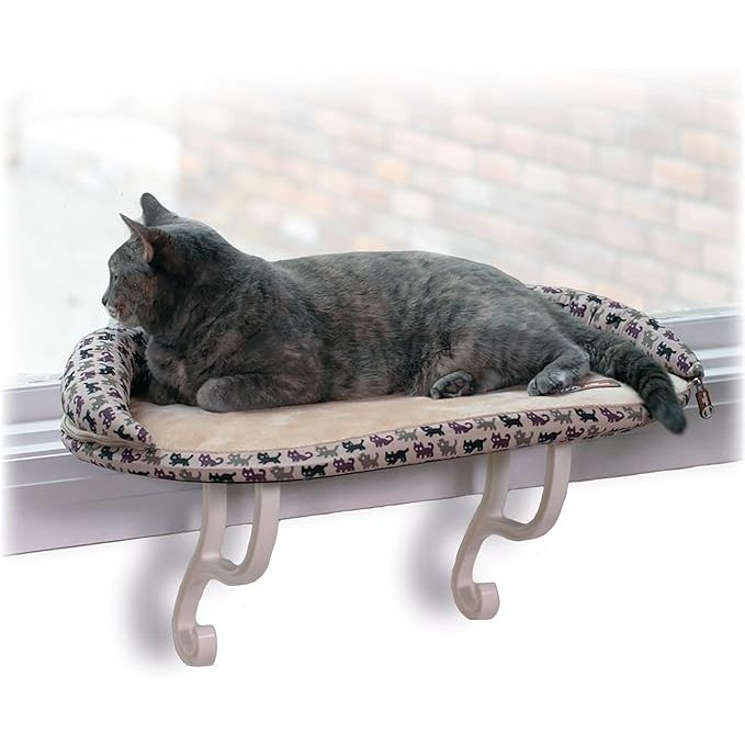 The K&H Pet Products Deluxe Kitty Sill with Bolster is a cozy and comfortable cat window bed designed for large cats. This cat window perch provides a secure and elevated spot for your feline friend to relax and enjoy the view from a window. The hammock design allows your cat to bask in the warmth of the sun while feeling safe and secure.