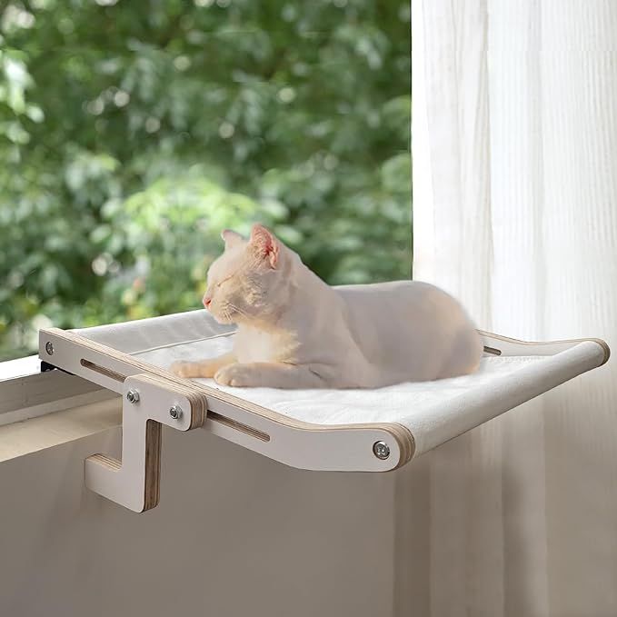 Treat your feline friend to the ultimate sunbathing experience with our 360° Cat Hammock for Window! This innovative cat perch allows your cat to enjoy all-around sunbathing while watching the natural scenery and birds outside.