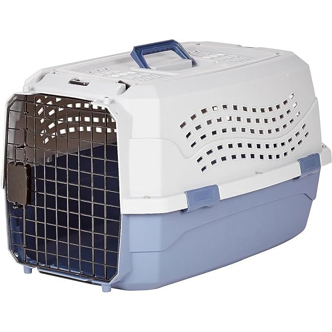 The AmazonBasics 23-Inch Two Door Top Load Pet Kennel is a portable and durable pet carrier designed for small to medium-sized dogs and cats. It features a sturdy plastic construction with steel wire front and top doors for easy access and ventilation. The top load design allows for easy and stress-free loading of your pet.