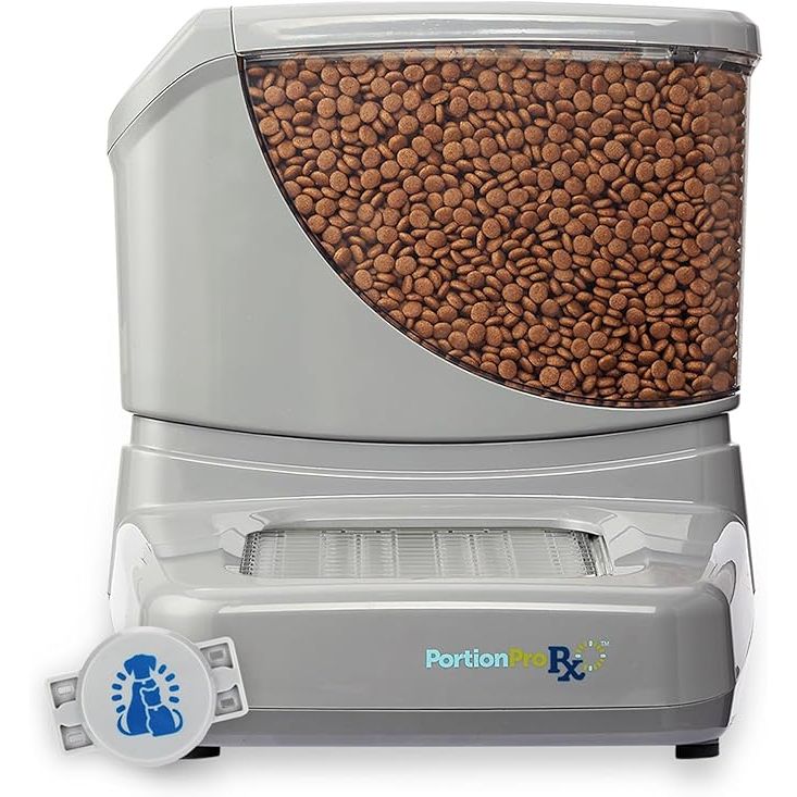 The PortionPro Rx Automatic Pet Feeder is a revolutionary device that uses active RFID technology to prevent food stealing and ensures that each pet receives their prescribed amount of food. This feeder is perfect for households with multiple pets, as it can schedule individualized meals for each one, whether they are cats or dogs.