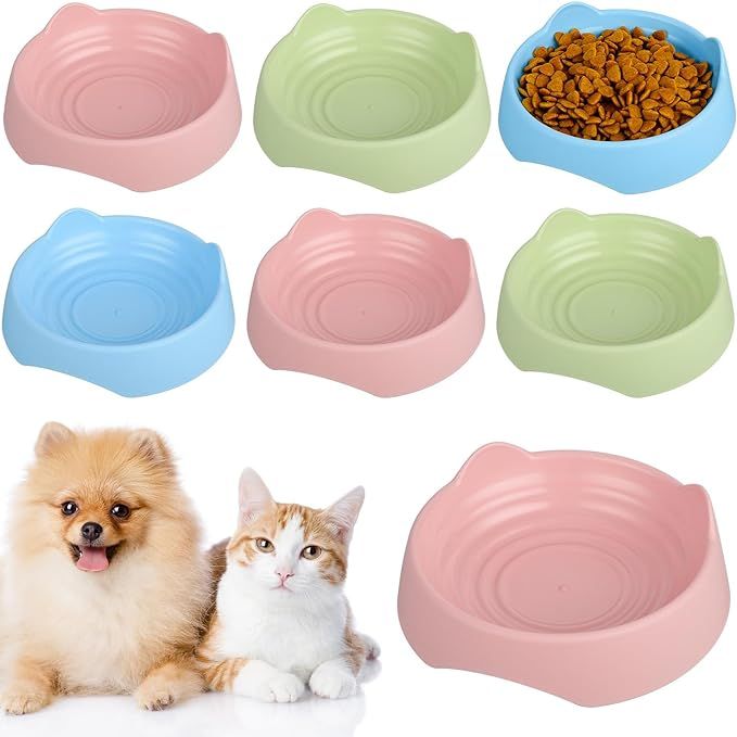 This package of 6 plastic food bowls for pets in 3 colors is the perfect addition to any home with multiple pets or for different areas of the house for a single pet. The package includes 2 bowls of each color, providing plenty of options for mixing and matching.