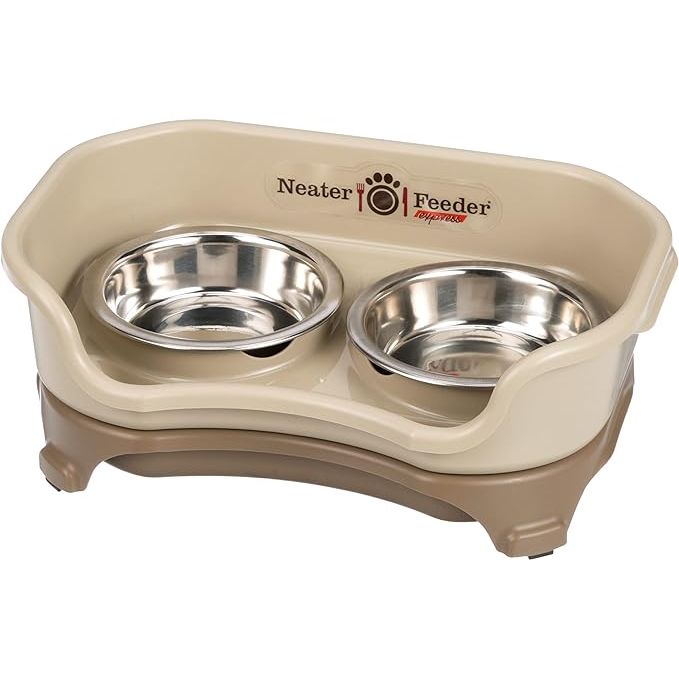 The Neater Feeder - Express Model is a mess-proof cat bowl designed to prevent spills and keep your cat's feeding area clean. This model is specifically designed for cats and comes in a cappuccino color. It is made in the USA and features elevated stainless steel bowls to provide a comfortable feeding experience for your pet.