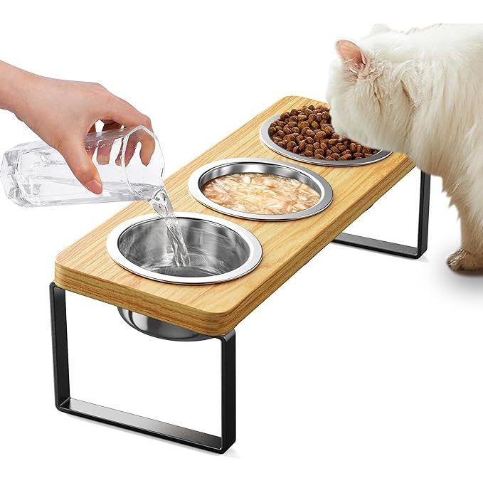 Elevated Cat Bowls with 3 Stainless Steel Bowls are designed to provide a more comfortable dining experience for small cats and puppies. The raised stand allows for a 10° tilt, which reduces strain on your pet's neck and promotes better digestion by encouraging a more natural feeding posture.