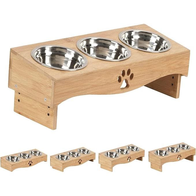 The JAZUIHA Elevated Cat Food Bowls is a set including a wooden stand and three tilted bowls, designed to make feeding easier and more comfortable for cats. The raised design of the bowls helps to reduce neck strain and improve digestion for pets.