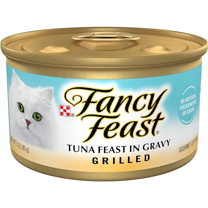 Purina Fancy Feast Grilled Wet Cat Food Tuna Feast in Wet Cat Food Gravy is a high-quality canned cat food made with real tuna as the primary ingredient. It is specially formulated to meet the nutritional needs of adult cats, providing a balanced diet rich in protein to support muscle health. Each 3 oz.