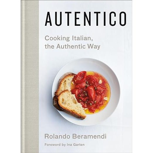 Discover the heart of traditional Italian cuisine with Autentico: Cooking Italian, the Authentic Way, your ultimate cookbook penned by culinary maestros Rolando Beramendi, Ina Garten, Laurie Frankel, and Rebekah Peppler. Delve into the pages of this epicurean treasure to unveil time-honored recipes and insider techniques that empower home chefs to infuse their cooking with Italy's legendary flavors. From sumptuous pasta masterpieces to robust stews and decadent confections, Autentico curates an array of dishes expertly crafted by four authorities on Italian gastronomy—perfect for diversifying your culinary portfolio or savoring a slice of Italy at home.

Autentico does more than just offer recipes; it's a curated culinary journey through Italy's regional taste profiles, celebrating the unique and diverse traditions of Italy's local fare. Each chapter is a passport to a different region, emphasizing the essential role top-tier elements—think fresh-pressed extra virgin olive oil, aromatic herbs, and peak-season produce—play in manifesting the soul of Italian dishes. With its inviting, user-friendly format and vivid, eye-catching photography, Autentico not only educates but also entices the senses, making it the ideal inspiration for those passionate about the splendor of Italian gastronomy.

More than a cookbook, Autentico is a connoisseur's guide to crafting an Italian feast that resonates with authenticity. It's brimming with practical advice on sourcing the finest ingredients, alongside thoughtful wine pairings and presentation tips to elevate your meals from delicious to sublime. Whether you're a budding chef eager to learn the fundamentals or a well-seasoned cook aiming to refine your Italian culinary technique, Autentico: Cooking Italian, the Authentic Way stands as the quintessential resource for anyone captivated by the craft of genuine Italian cuisine.