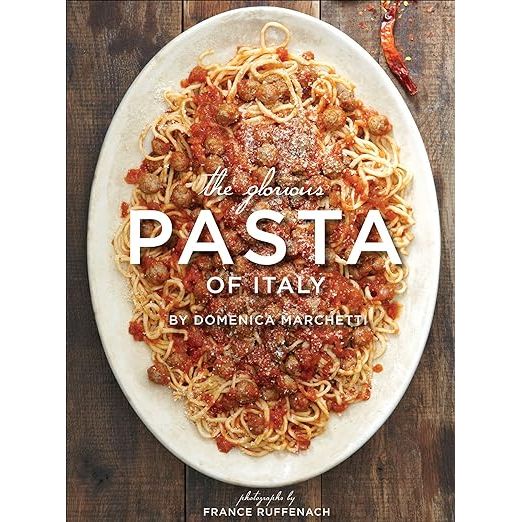 Immerse yourself in the sumptuous world of authentic Italian pasta with The Glorious Pasta of Italy. This exquisite cookbook guides you through Italy's culinary heart, offering over 100 time-honored recipes paired with stunning photography by France Ruffenach. Compiled by celebrated author Domenica Marchetti, this essential kitchen companion reveals the secrets behind Italy's varied and vibrant pasta dishes, inviting you to recreate the treasured flavors of this Mediterranean haven.

Domenica Marchetti's The Glorious Pasta of Italy elevates the art of pasta-making to new heights. Complete with step-by-step instructions, this gastronomic masterpiece simplifies the process of crafting traditional and inventive pasta delicacies. Marvel at the richness of regional specialties and learn to distinguish the nuances among Italy's iconic pasta shapes. Whether you're whipping up a quick weekday dinner or indulging in a leisurely feast, this cookbook promises to enhance your culinary skills and impress both your palate and your guests.

Embark on a flavorful odyssey with Domenica Marchetti, as she weaves personal anecdotes with cherished family recipes into the fabric of this book, making The Glorious Pasta of Italy more than just a cookbook—it's an heirloom. From the novice home cook to the seasoned chef, be drawn into the passion and craft of Italy's gastronomic legacy. Relish the authentic Italian experience as you discover the simple joy and profound artistry within the pages of The Glorious Pasta of Italy.