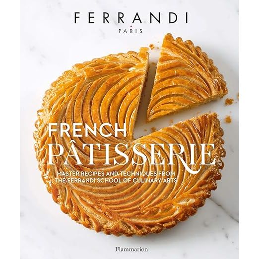 Delve into the world of elegant French pastry-making with French Pâtisserie: Master Recipes and Techniques from the Ferrandi School of Culinary Arts, your quintessential guide authored by pastry connoisseurs Audrey Janet, Estérelle Payany, and Rita Nurra. Brought to you in collaboration with the reputable Ferrandi School of Culinary Arts in Paris, this cookbook transcends the ordinary, offering home bakers the opportunity to master the revered methods of seasoned patissiers. Embark on a delectable journey to recreate authentic French delights in your own kitchen with confidence and finesse.

Unveil the secrets behind a plethora of timeless French pastries, from the simplicity of buttery tarts to the sophistication of elaborate entremets and the finesse of featherlight macarons. Clear, step-by-step guidelines paired with insightful technique explanations make this cookbook an indispensable tool not just for the culinary enthusiast but also for baking novices eager to indulge in the craft. Beyond the fundamental recipes, the authors impart invaluable wisdom through tailored tips, ensuring every attempt leads to perfection—complete with suggestions for inventive tweaks to stamp your signature on each confection.

French Pâtisserie: Master Recipes and Techniques from the Ferrandi School of Culinary Arts stands as more than just a cookbook—it is a passport to the prestigious realm of haute pâtisserie. As you turn each page, you'll be greeted by stunning photography that captures the essence of classic French baking, complementing the expert guidance enclosed. This book promises to elevate the home baking experience, offering you the know-how to weave the allure of Parisian pastries into your culinary tapestry. Experience the joy of crafting extraordinary pastries that speak the language of French elegance right in your home.