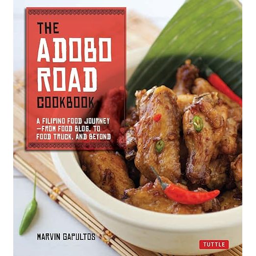 Embark on a culinary adventure with The Adobo Road Cookbook: A Filipino Food Journey by Marvin Gapultos, your ultimate guide to mastering the vibrant and diverse world of Filipino cuisine. This treasure trove of mouth-watering Filipino recipes, meticulously compiled by Gapultos, brings the Philippines' rich gastronomic culture and heritage to your kitchen. Perfect for food enthusiasts eager to savor the robust and complex flavors of this Southeast Asian archipelago, each page radiates with the love for Filipino cooking.

Dive into the heart of Filipino gastronomy with Marvin Gapultos as your guide. Explore the aromatic and bold traditional tastes that define this exotic cuisine with recipes covering everything from the savory comfort of adobo and the tangy warmth of sinigang, to the dynamic symphony of seafood entrees and the sweet allure of native desserts. The Adobo Road Cookbook isn't just a collection of recipes—it's a passionate journey through the Philippines' storied food landscape, inviting you to experience each region's specialties.

This cookbook is thoughtfully designed for home chefs of all skill levels to successfully bring Filipino flavors to the table. With comprehensive step-by-step instructions and stunning photography that captures the essence of each dish, The Adobo Road Cookbook is both a visual feast and an indispensable kitchen companion. Whether you're a curious food lover or a connoisseur of Filipino culture, you’ll find inspiration within these pages to unlock the secrets of traditional Filipino cooking and entice your taste buds with the authentic taste of the Philippines.