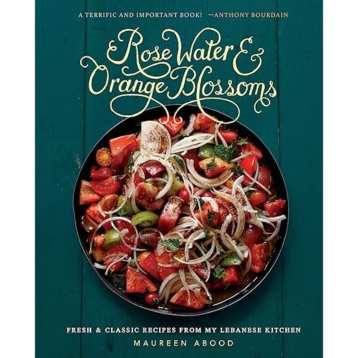 Embark on a gastronomic journey with Rose Water and Orange Blossoms: Fresh & Classic Recipes from my Lebanese Kitchen, authored by the culinary connoisseur, Maureen Abood. This beautifully curated cookbook opens up a treasure trove of Lebanese cuisine, showcasing the richness and diversity of recipes steeped in tradition and elevated with a modern flair. Abood weaves her profound cultural heritage into each page, presenting a collection that is as approachable as it is enticing. Home chefs of every skill level will find joy and ease in bringing the essence of Lebanese flavors to their dining tables.

Immerse yourself in the colorful world of Lebanese gastronomy with this all-encompassing guide. Rose Water and Orange Blossoms tantalizes the senses with a plethora of dishes ranging from the zesty and light mezzes and salads to the sumptuous main dishes, rounded off with delectable desserts—all embodying the quintessential aromatic spices and fresh produce of the Middle East. Abood enriches her recipes with captivating narratives of each dish's roots, weaving a rich tapestry of culinary lore. The vivid photography and personal touches nestled throughout the book make it more than a simple guide; it's a narrative homage to a culture renowned for its hospitality and love of good food.

Rose Water and Orange Blossoms stands as an indispensable kitchen companion for anyone yearning to delve into the heart of Lebanese gastronomy. A celebration for the taste buds and a cultural sojourn, Maureen Abood's collection promises inspiration and a dash of heritage in every meal, from everyday cooking to sumptuous feasts. Embrace the zestful spirit of Lebanon and let this book guide you in creating not just meals, but memories that bridge cultures and generations. Whether you're a dab hand in the kitchen or beginning your culinary adventures, let Rose Water and Orange Blossoms add a sprinkle of Lebanese legacy to your recipe repertoire.