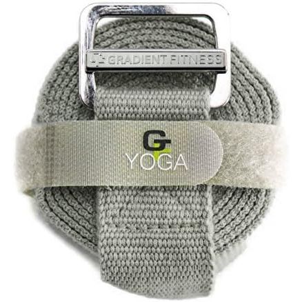 The Gradient Fitness Yoga Strap is a high-quality tool designed to enhance your yoga practice. It features a friction-less easy-feed buckle that allows for quick and effortless adjustments to the strap's length, ensuring a secure and comfortable fit for various poses and stretches.