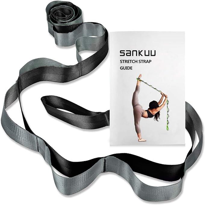 The SANKUU Yoga Straps Stretching Strap is a versatile and durable tool designed to help improve flexibility, enhance performance, and prevent injury during fitness routines. This stretching strap features 12 loops along its length, allowing for easy adjustment and control of the intensity of the stretch.