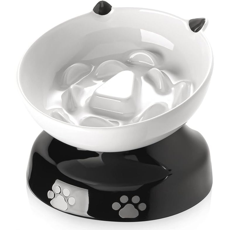 The Y YHY Slow Feeder is an elevated food bowl designed for both dogs and cats. It features a tilted design which promotes slower eating habits, preventing digestive issues such as bloating and overeating.