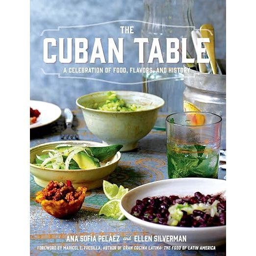 Discover the tantalizing flavors of Cuba with The Cuban Table: A Celebration of Food, Flavors, and History, the ultimate culinary guide by Ana Sofia Pelaez, complemented by the stunning visuals of photographer Ellen Silverman. This all-encompassing cookbook goes beyond simple recipe collection; it invites you on a gastronomic journey that intertwines over 100 traditional and contemporary Cuban delicacies with captivating narratives of the culture and ancestry that mold Cuban cuisine. An essential in the kitchen of any food enthusiast, this book promises to enrich your palate and enlighten your understanding of Cuba's gastronomic legacy.

Delve into a world where each page turn introduces you to the heart of Cuba's culinary diversity through the eyes of Ana Sofia Pelaez, a Cuban-American writer, and blogger renowned for her authentic approach to food storytelling. Whether you're eager to recreate the comfort of Ropa Vieja, dabble in the unique flavors of Malanga Fritters, or experiment with Guava Barbecue Ribs, The Cuban Table opens the door to a myriad of flavors suited for the beginner cook and the seasoned chef alike. Each recipe is meticulously designed to celebrate the rich tapestry of tastes that is intrinsic to the island's food culture, making every meal a festive occasion.

Step into the rhythm of Cuban cooking as The Cuban Table delves deep into the island's culinary history, unveiling the intricate mosaic of influences that craft its distinctive gastronomy. From ingredient spotlights to detailed cooking techniques and regional specialties, Ana Sofia Pelaez offers more than just recipes—she provides a comprehensive guide to understanding the very essence of Cuban fare. Perfect for culinary adventurers keen to broaden their horizons, The Cuban Table stands as an invaluable tome for those wishing to savor and explore the vibrant soul of Cuban cuisine.