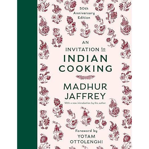 Dive into the rich tapestry of Indian flavors with Madhur Jaffrey's An Invitation to Indian Cooking: 50th Anniversary Edition: A Cookbook, a must-have for any culinary enthusiast. Celebrating half a century of gastronomic excellence, this revered guide has stood the test of time, cementing its position as a cornerstone of Indian culinary literature since its first publication in 1973. Madhur Jaffrey, whose name is synonymous with Indian gastronomy, brings her celebrated chef prowess, captivating food writing, and versatile talents as an actress to this comprehensive collection of delectable dishes.

Embark on a flavorful journey with this seminal work that effortlessly marries the simplicity of everyday meals with the intricate excitement of festive Indian cooking. Whether you're a kitchen novice or a seasoned chef, Jaffrey's eloquent narrative and user-friendly instructions make mastering over 100 Indian recipes an achievable and enjoyable endeavor. This updated edition invites you to traverse the vast culinary landscape of India, from the subtleties of spiced lentil dals to the bold symphonies of tandoori meats, all achievable within the comforts of your own kitchen.

Enhanced by the thoughtful foreword penned by culinary maestro Yotam Ottolenghi, the 50th Anniversary Edition of An Invitation to Indian Cooking garners well-deserved praise, as Ottolenghi himself celebrates Madhur Jaffrey's indelible impact on the global cooking scene. This anniversary edition isn't just a cookbook; it's an heirloom treasure that promises to ignite a lifelong love affair with the intricate delights of Indian cuisine, making it an indispensable addition to any discerning cook's library.