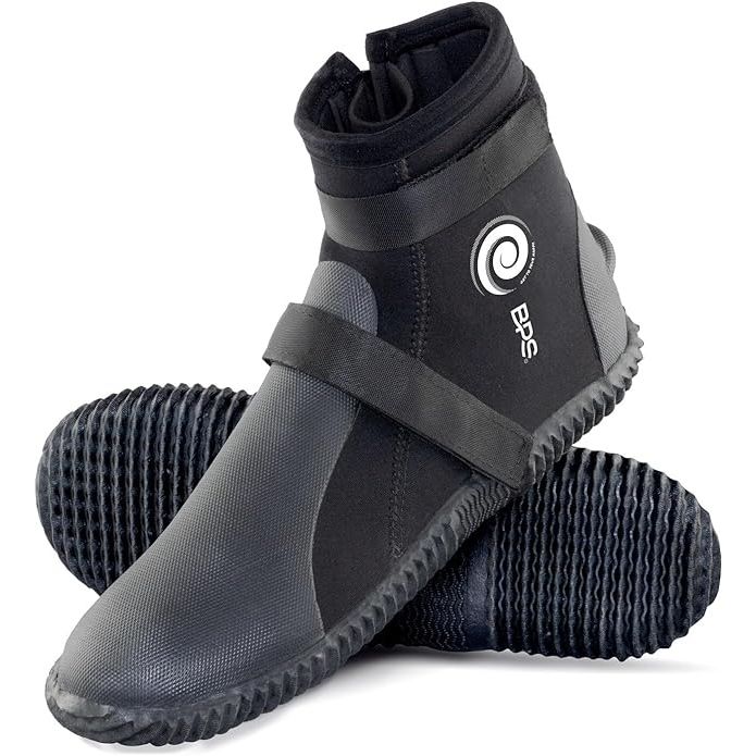 The BPS 3mm and 5mm Neoprene Dive Boots are designed for water sports enthusiasts, especially those who engage in scuba diving, snorkeling, surfing, and other similar activities. These boots are made from high-quality neoprene material, which provides warmth and protection to the wearer's feet in cold water environments.