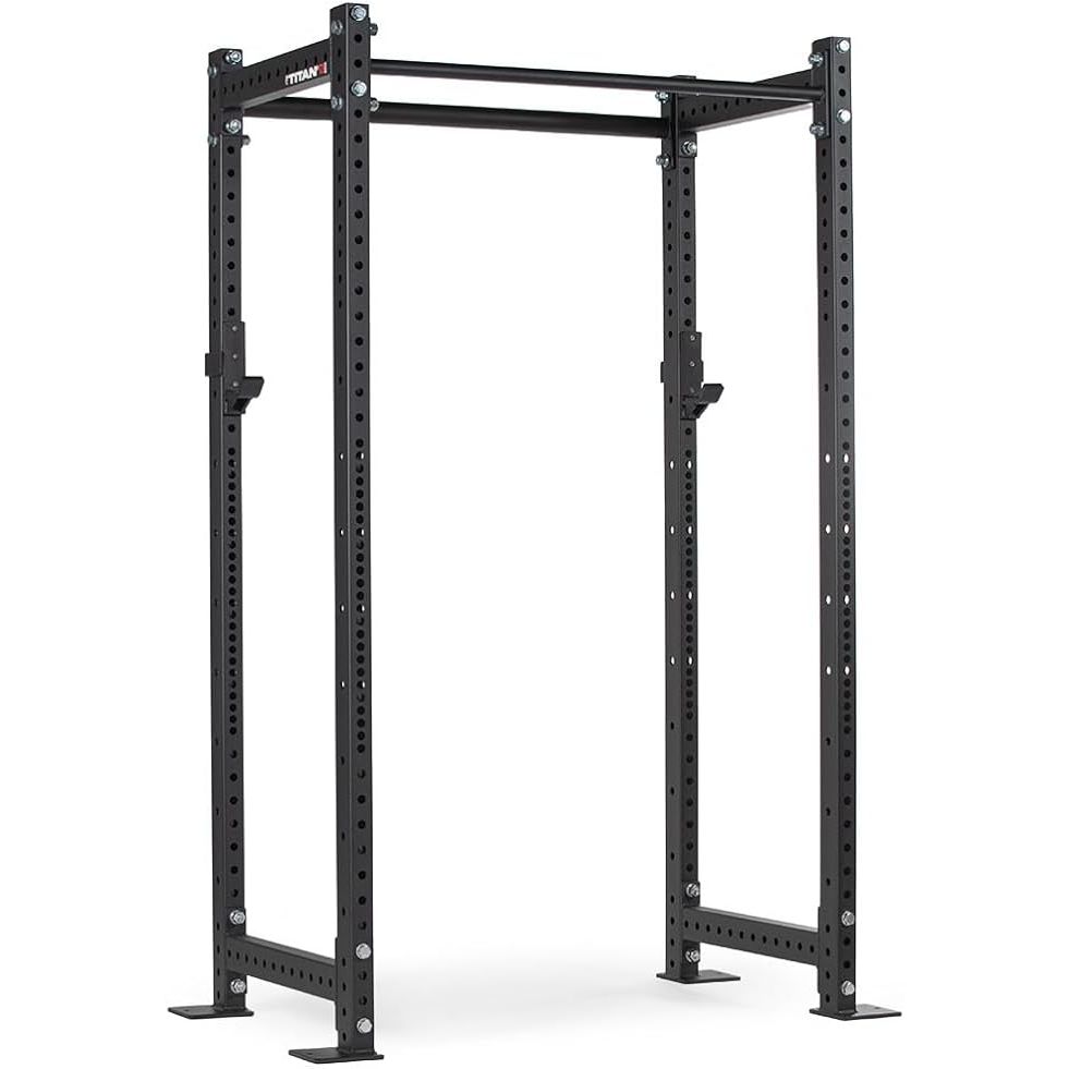 The Titan Fitness T-3 Series Power Rack is a heavy-duty cage designed for weightlifting and strength training. It has a weight capacity of 1,100 pounds, making it suitable for a wide range of users and exercises. The rack is constructed from high-quality steel, providing durability and stability during intense workouts.