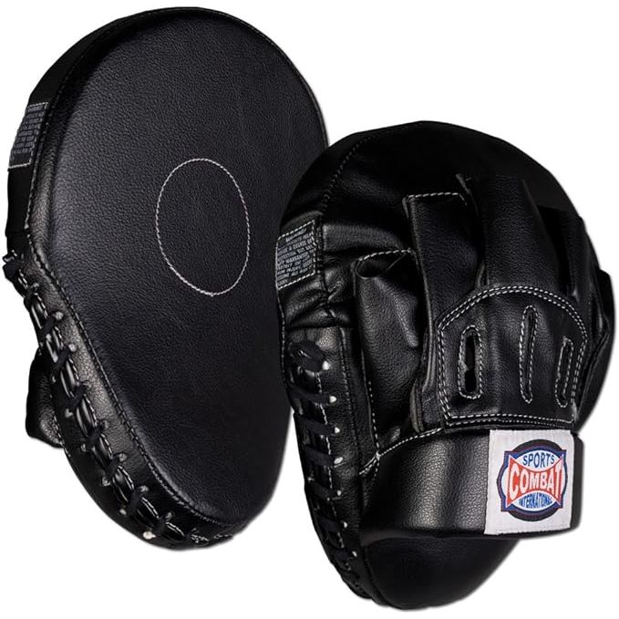 Combat sports punch mitts are training tools used by fighters, coaches, and trainers to improve hand-eye coordination, speed, and accuracy. They are typically made of durable materials such as leather or synthetic leather, and feature padding to protect the holder's hands and wrists from impact.