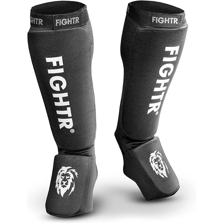 The FIGHTR® Shin Guards are designed to provide optimal fit and padding for maximum protection during combat sports such as kickboxing, MMA, Muay Thai, and more. These shin guards are crafted with high-quality materials that ensure durability and maximize impact resistance to shield your shins from injury during training and sparring sessions.