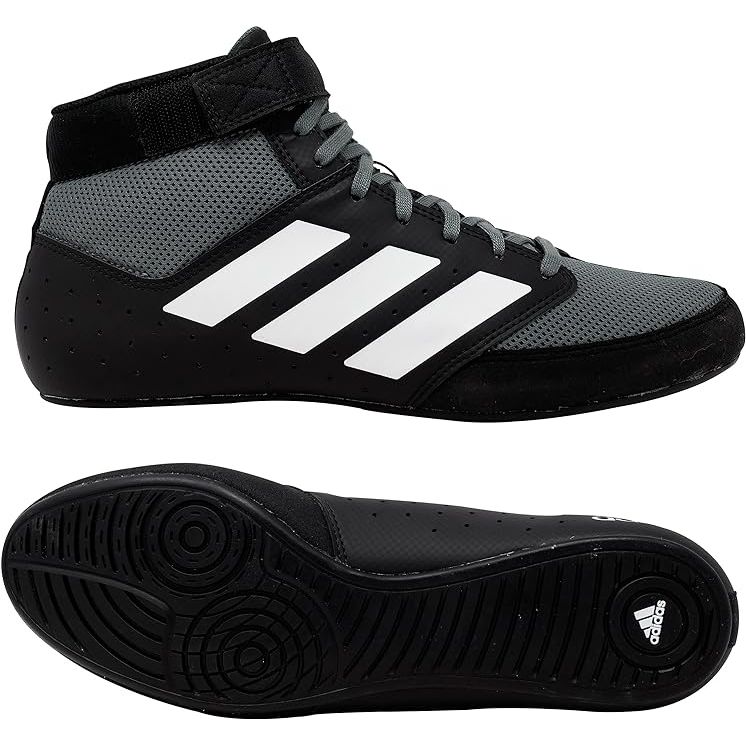 The adidas Men's Mat Hog 2.0 Wrestling Shoe is a high-performance shoe designed specifically for wrestlers. It features a lightweight and breathable upper construction made of synthetic materials that provide durability and support during intense matches. The shoe also has a lace-up closure system that ensures a snug and secure fit for the wearer.