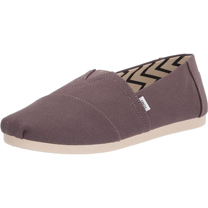 TOMS Men's Alpargata Loafer Flat is a popular and versatile shoe option for men. The Alpargata style is a classic slip-on design with a comfortable fit and a casual, laid-back look. It features a canvas upper and a rubber sole that provides traction and durability.
These loafers are known for their comfortable feel and easy-to-wear style.