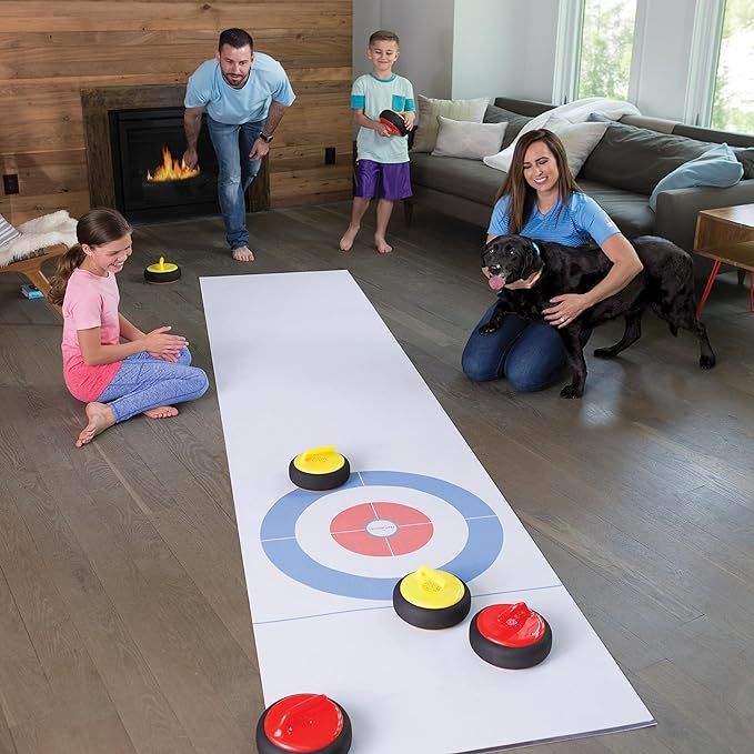 Bring the thrill of the ice rink into your living room with our Indoor Curling Set! This miniature set includes 6 hovering curling stones and a large, durable play mat with a brightly colored target, providing all the strategy and excitement of the real game.