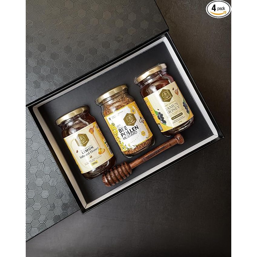 The Shiva Organic Gift Box is a specially curated collection of handpicked superfoods designed to boost energy and immunity. The box includes high protein, mineral, and vitamin-rich items such as 250g of Lemon Honey, 125g of Mustard Bee Pollen, and 250g of Jamun Honey.