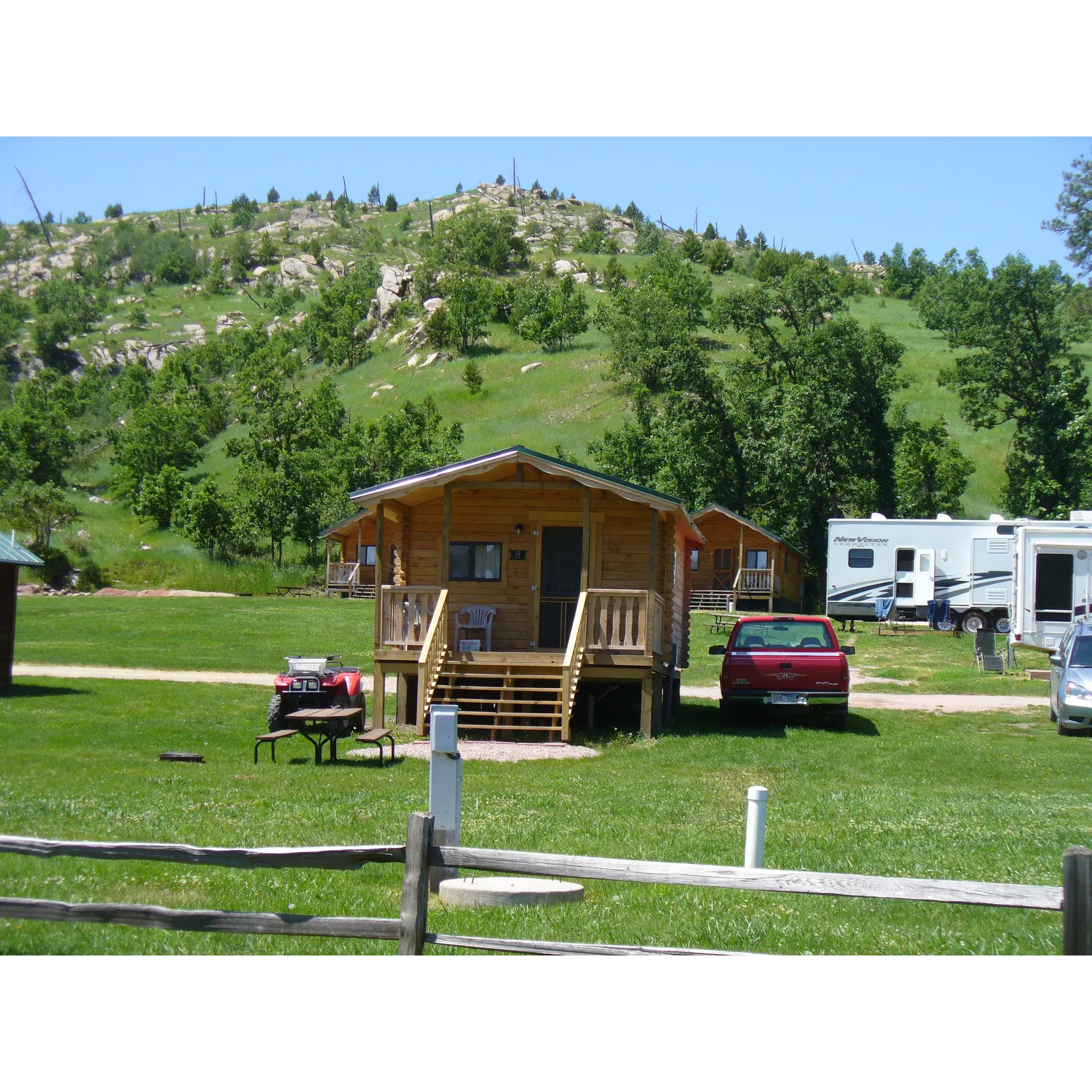 Spokane Creek Cabins & Campground emerges as an idyllic paradise for outdoor enthusiasts, family excursions, and nature lovers. Offering a scenic blend of luxurious cabins, ample RV spots, and serene camping grounds, the location captivates its visitors with the splendor of the great outdoors and modern conveniences. Proximity to Keystone and the iconic Mt. Rushmore allows guests to discover the region's historic charm and natural beauty, including local wildlife such as deer and even the possibility of seeing wolves nearby.

Praised for its pristine facilities, the campground ensures a comfortable stay with a newly constructed shower house complete with full bathroom facilities and a laundry room, easing the traditional camping experience with a touch of home comfort. The delightful campground café serves memorable treats, from their talked-about breakfast pizza to irresistible cinnamon rolls, all contributing to a gourmet experience under the canopy of stars.

The warmth and hospitality of the staff, led by the ever-cheerful Laura, turns each stay into a personal and memorable visit, treating every guest as part of an extended family. The abundant recreational activities, from exploring nearby hills and creeks to enjoying a dip in the pool, playing mini-golf, or fishing in the trout pond, ensure a fun-filled getaway for the young and the young at heart.

Visitors also relish the local adventures awaiting right on the grounds, such as the hike to the Old Ghost Town, which presents a delightful treasure hunt through historical remnants. Moreover, Spokane Creek maintains connectivity and accessibility with reliable GPS directions for those venturing from Keystone, while the adventurous routes of Iron Mountain Road and Playhouse Road offer an exciting journey through this picturesque landscape.

Whether seeking a peaceful retreat among the trees and alongside a charming brook or an adventure-filled holiday, Spokane Creek Cabins & Campground stands as an impeccable choice, boasting a true blend of outdoor splendor and comfort that leaves a lasting impression on all who visit. Description by ChatGPT.